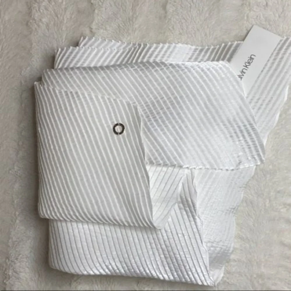 Calvin Klein accordion pleating